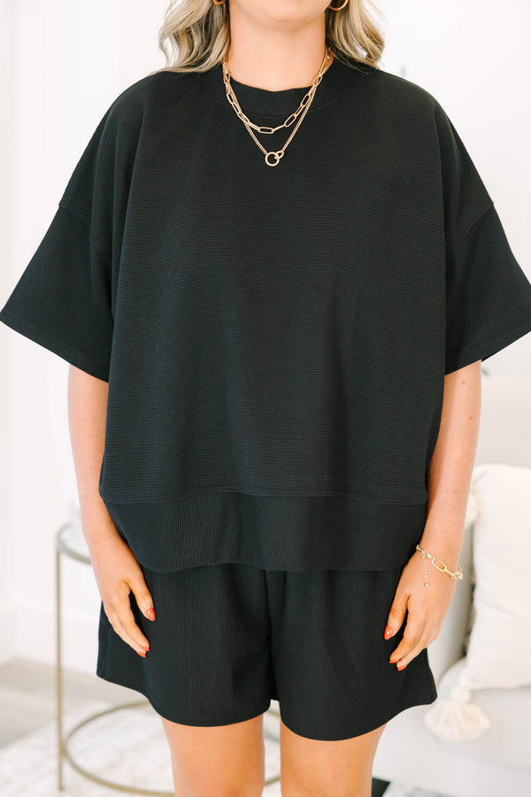 Plus Size black ribbed two-piece set with a boxy drop shoulder top and matching shorts.