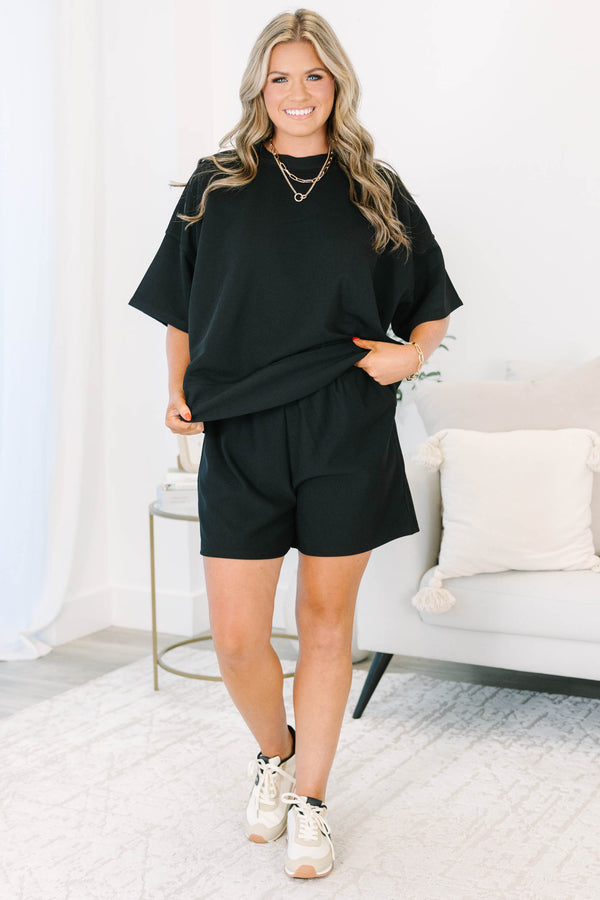 Plus Size black ribbed two-piece set with a boxy drop shoulder top and matching shorts.