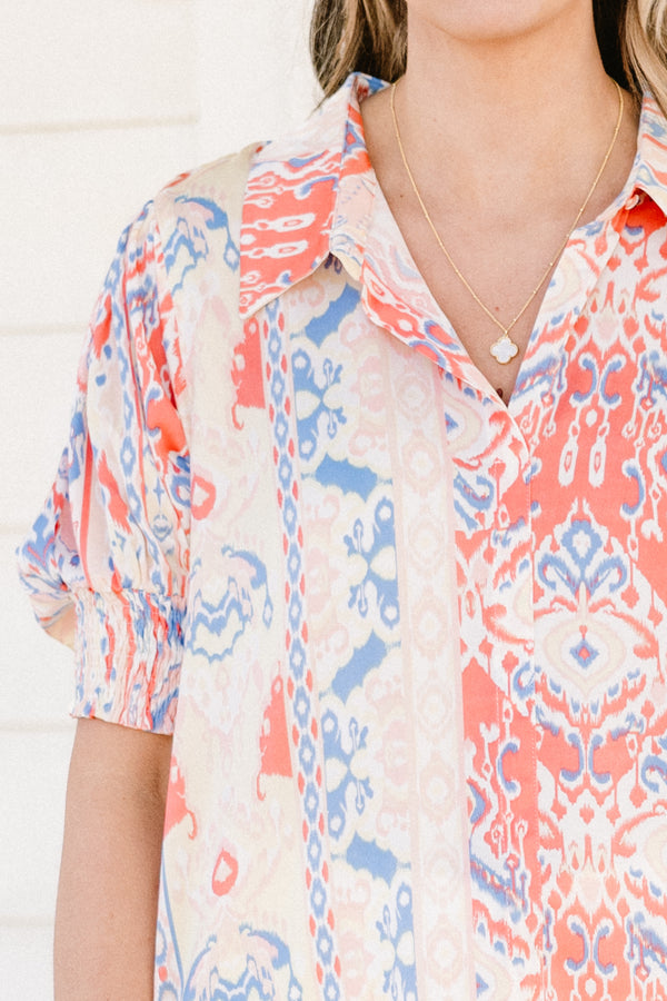 Chic Soul plus size clothing, white v-neck  collared short sleeve top with blue and peach abstract pattern