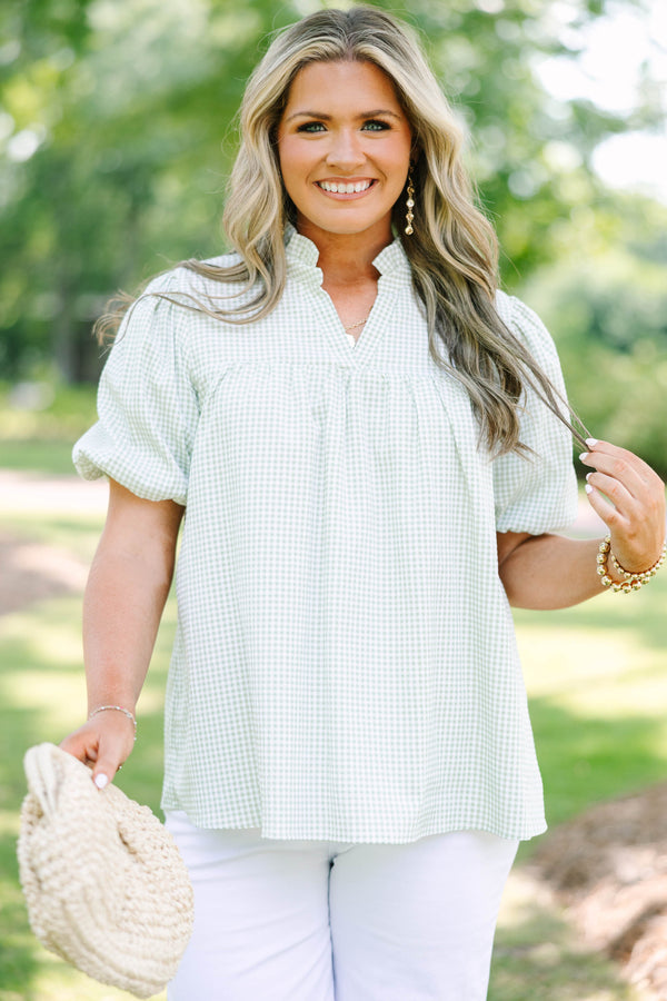 Plus Size green and white gingham top with puff sleeves, a ruffled collar, and a split neckline.