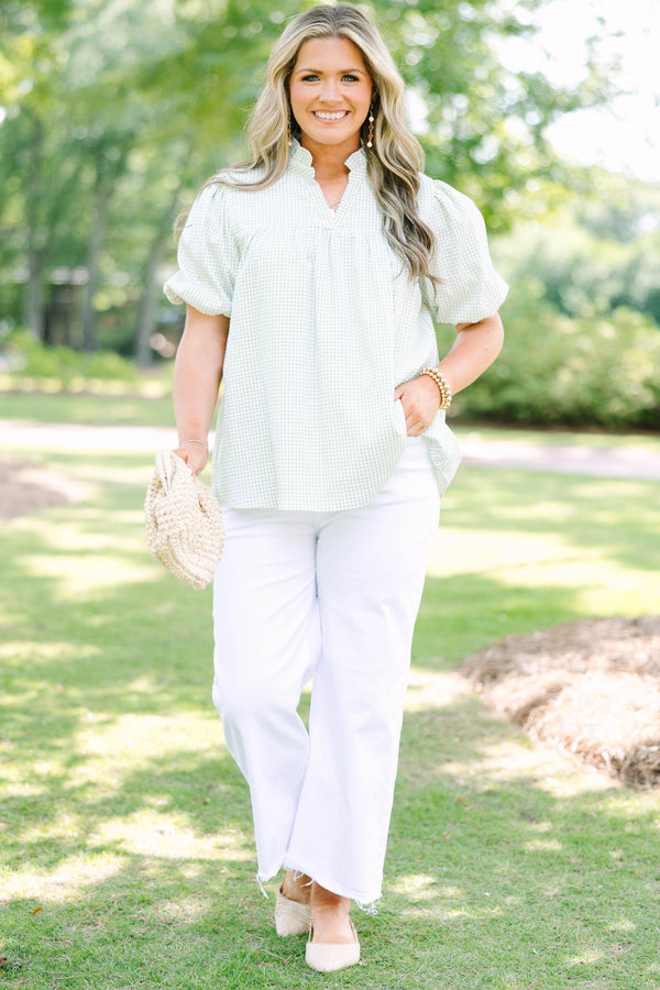 Plus Size green and white gingham top with puff sleeves, a ruffled collar, and a split neckline.
