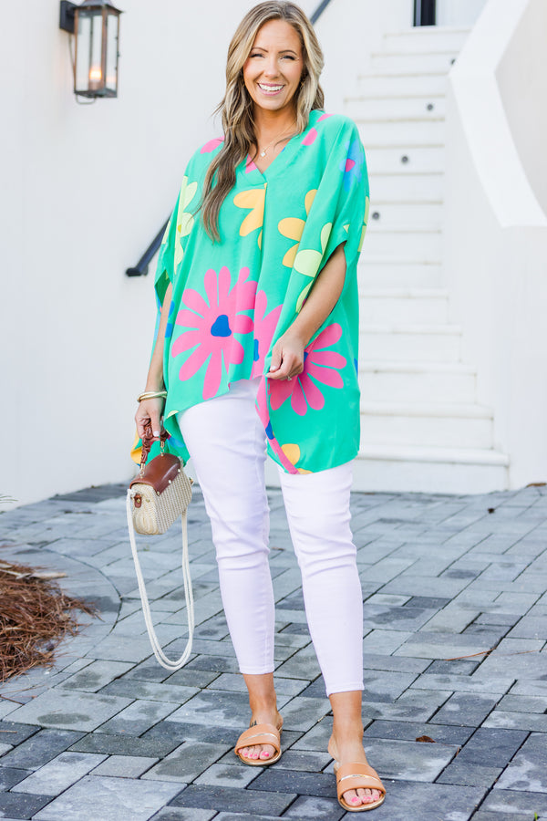 Chic Soul plus size clothing, short-sleeve flowy aqua green poncho top with a v-neckline and a bright multi-colored floral print