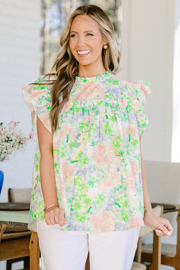 Chic Soul plus size clothing, green floral short sleeve pastel top with pink/purple floral design with mock neck and ruffle sleeves