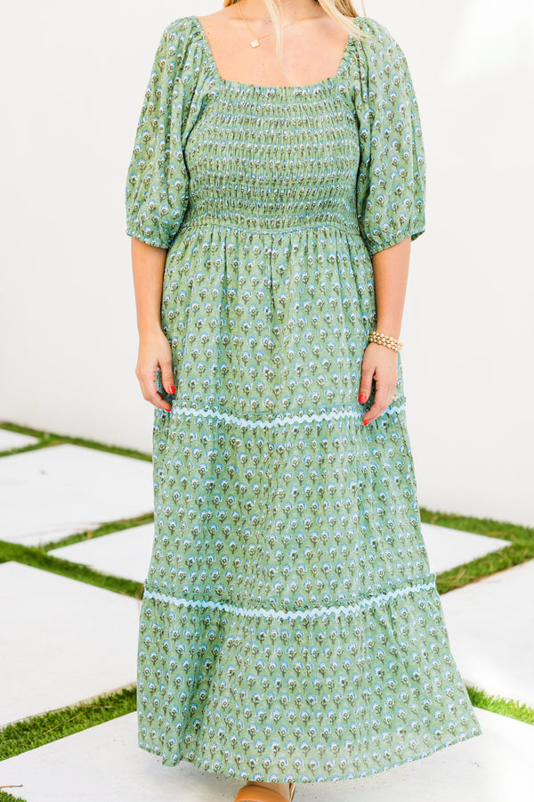 Chic Soul plus size clothing, short-puffed-sleeve green maxi dress with a tiered skirt and a ric rac detailing with a square neckline and a green floral print with a smocked bodice 