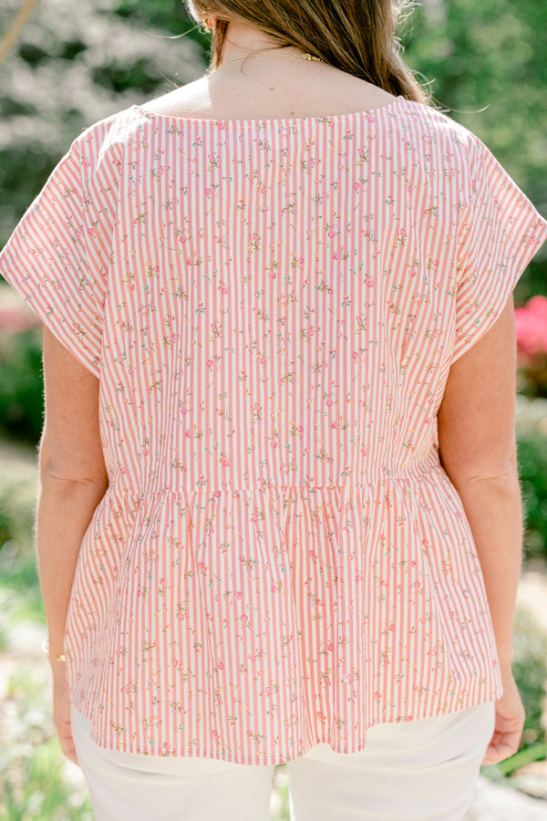 Chic Soul plus size clothing, pink stripe short sleeve top with ruffle along the bottom with bow tie detail along the front