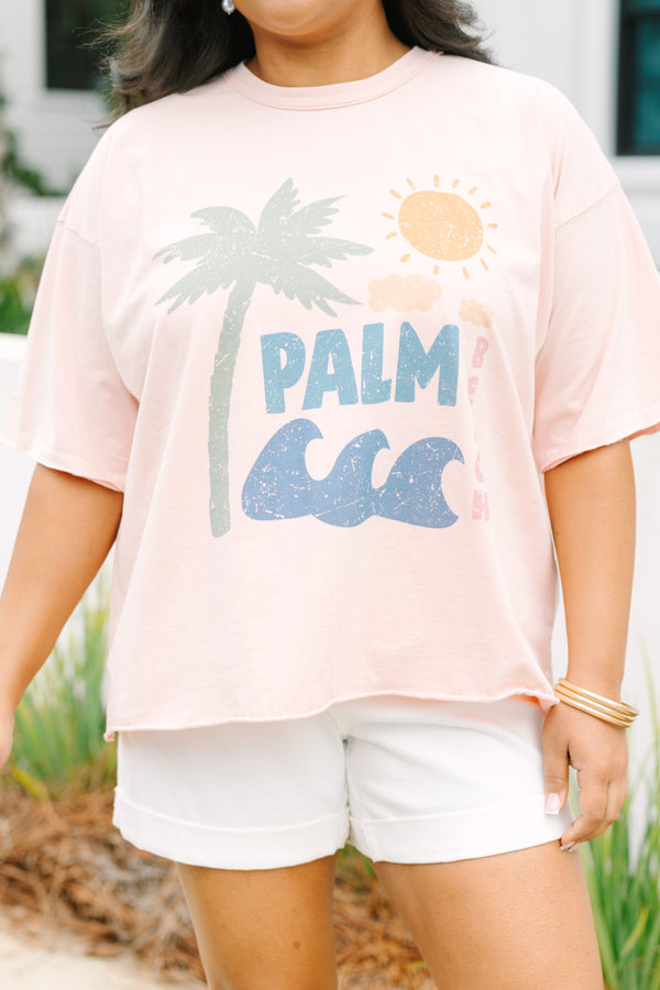 Plus Size blush pink vintage wash tee with a palm tree graphic and white denim shorts.