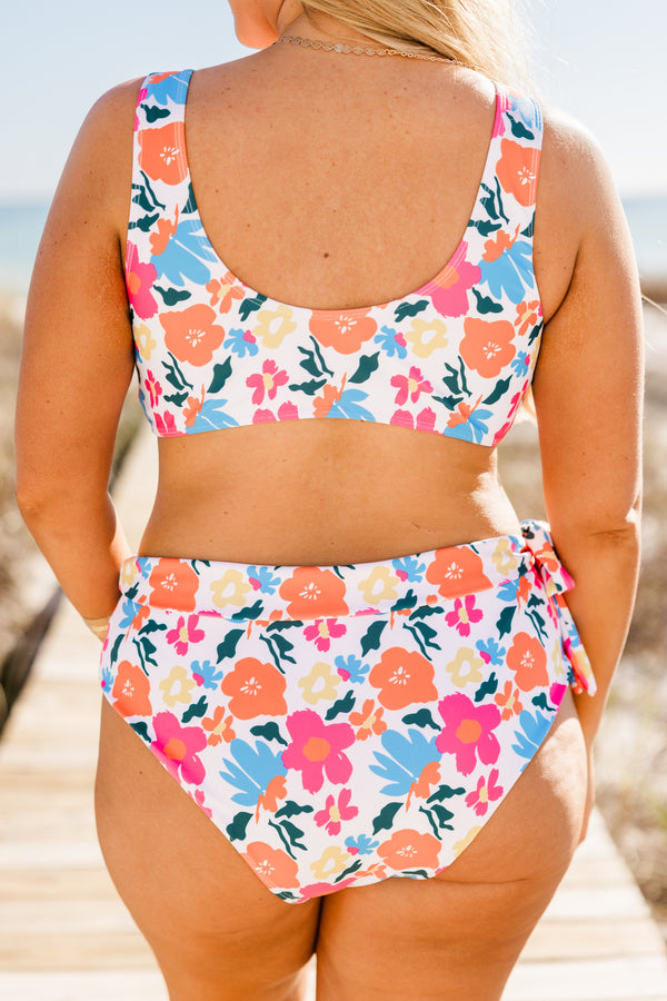 Chic Soul plus size clothing, sleeveless white swim top with a scoop-neckline and a pink multi-colored floral pattern 