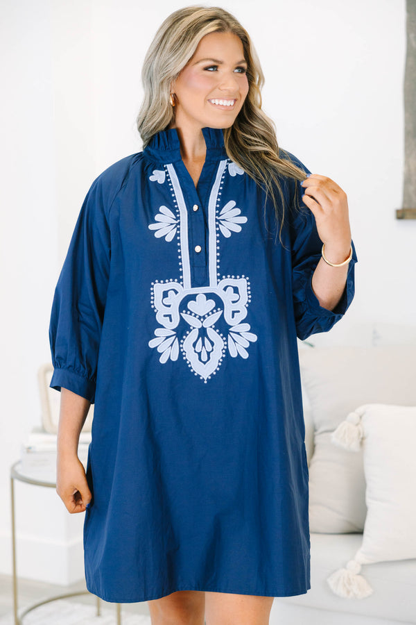 Plus Size blue shift dress with white embroidery, ruffled collar, and three-quarter puff sleeves.