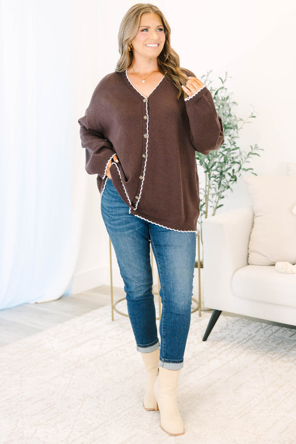 Plus Size brown oversized knit cardigan with white scalloped trim, V-neckline, and button front.