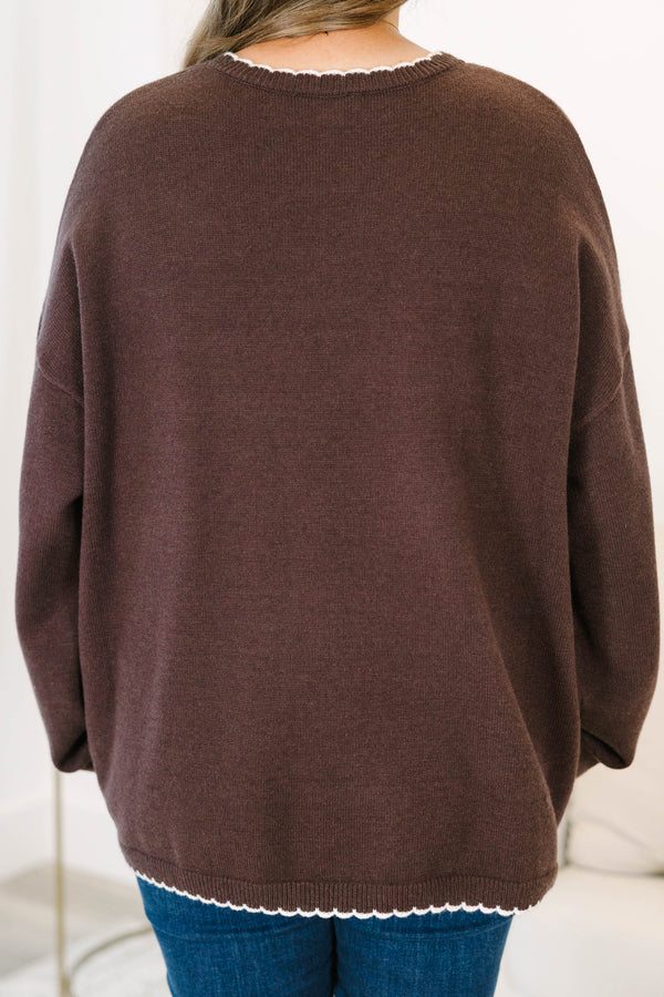 Plus Size brown oversized knit cardigan with white scalloped trim, V-neckline, and button front.