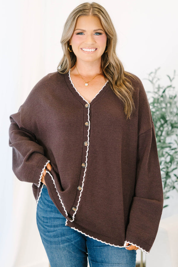 Plus Size brown oversized knit cardigan with white scalloped trim, V-neckline, and button front.
