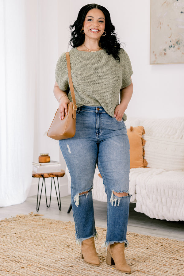 Chic Soul plus size clothing, medium wash distressed denim jeans with rips at the knees and fringe hem