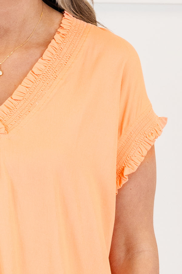 Chic Soul plus size clothing, short-sleeve salmon orange top with a v-neckline and smocked detailing along neckline and sleeves