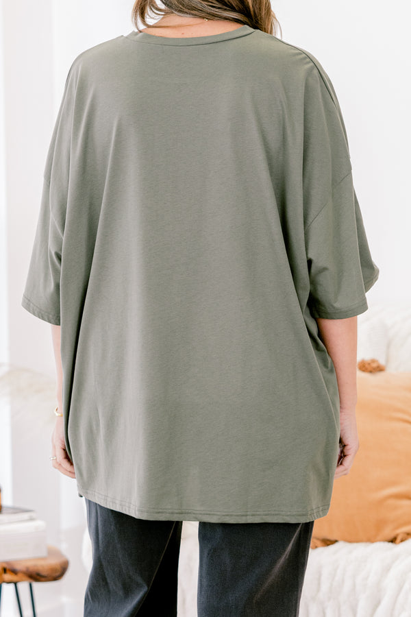 Chic Soul plus size clothing, moss green short sleeve boyfriend tee with 9 multi orange colored jack o' lantern trick or treat buckets on the front