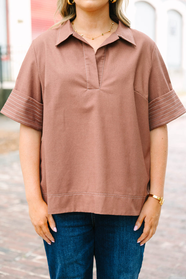 Plus Size brown short-sleeve top with a collared V-neckline and white contrast stitching details.