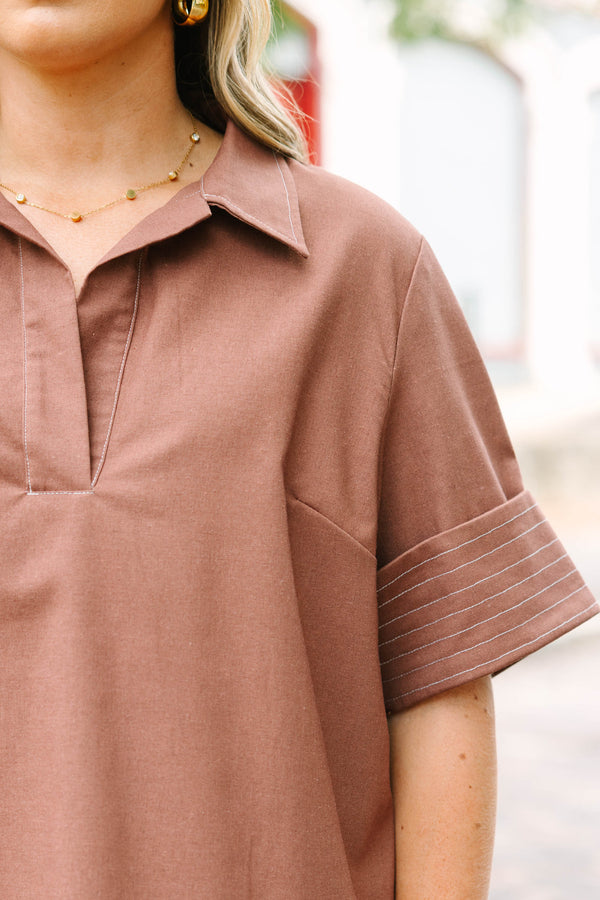 Plus Size brown short-sleeve top with a collared V-neckline and white contrast stitching details.