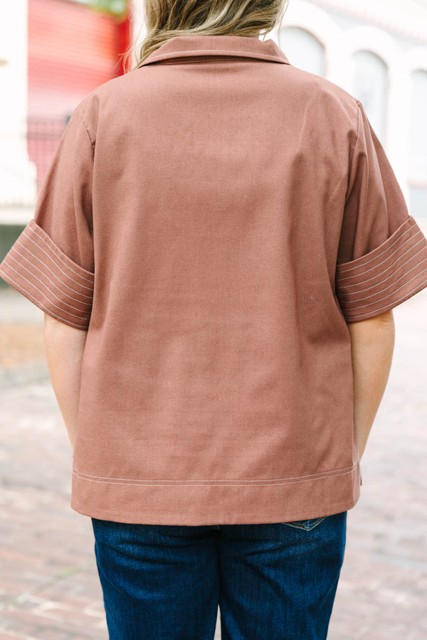 Plus Size brown short-sleeve top with a collared V-neckline and white contrast stitching details.