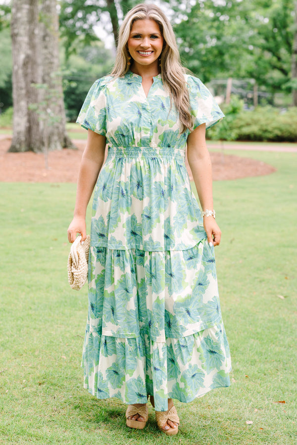Chic Soul plus size clothing, short-sleeve green maxi dress with a smocked waistline and a watercolor floral print with a tiered skirt and a v-neckline