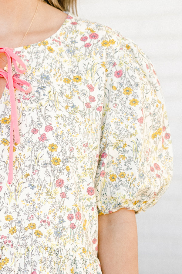 Chic soul plus size clothing, Pink short sleeve baby doll dress, with a floral pattern and tie bows on neckline