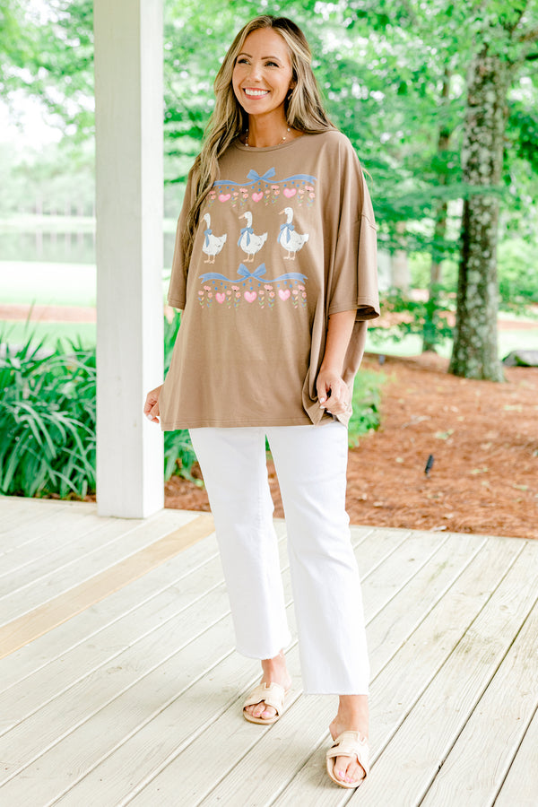 Chic Soul plus size clothing light brown short sleeve graphic tee, with three geese on the center of the shirt with bow accents above them 