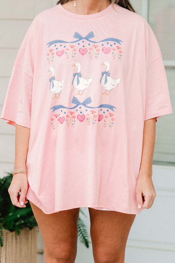 Plus Size dusty pink oversized boyfriend tee with a vintage coquette geese and bow graphic.