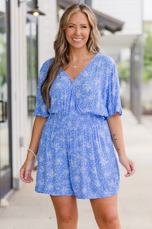 Chic Soul plus size clothing, Blue short sleeve romper with v neckline and smocked synched waist detail with small white floral detail