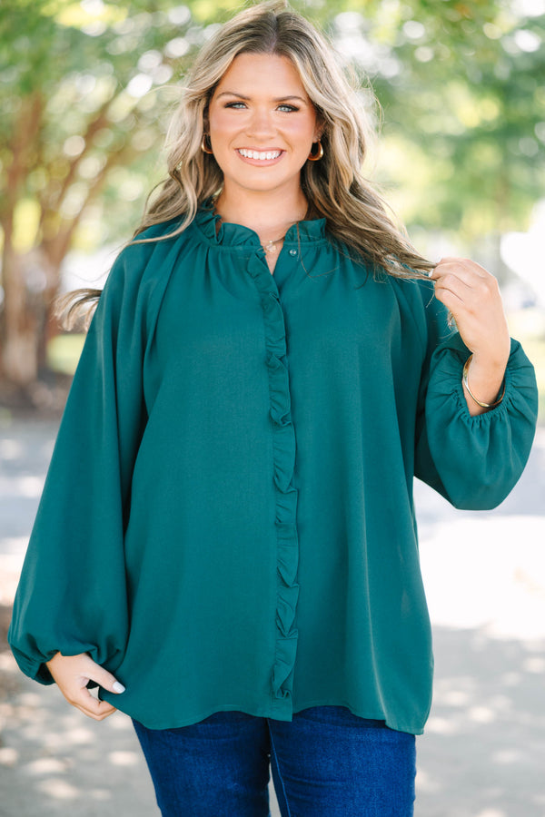 Plus Size forest green long sleeve top with a ruffled neckline and button-down front.