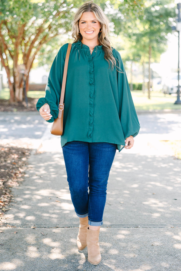 Plus Size forest green long sleeve top with a ruffled neckline and button-down front.