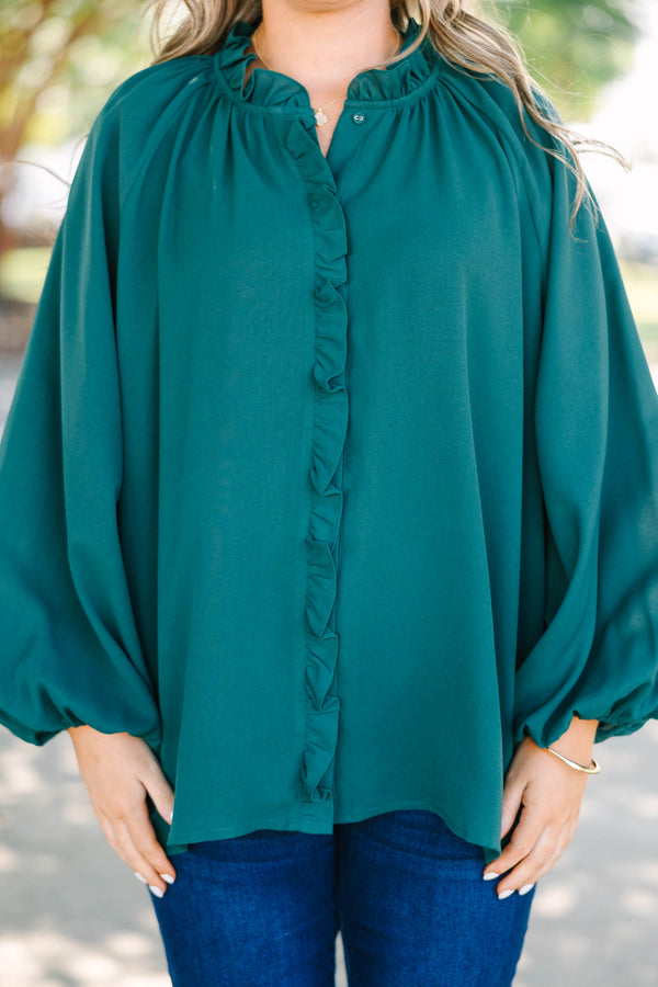 Plus Size forest green long sleeve top with a ruffled neckline and button-down front.