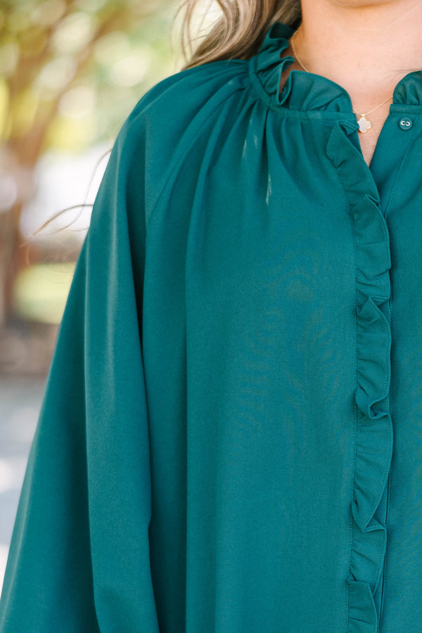 Plus Size forest green long sleeve top with a ruffled neckline and button-down front.