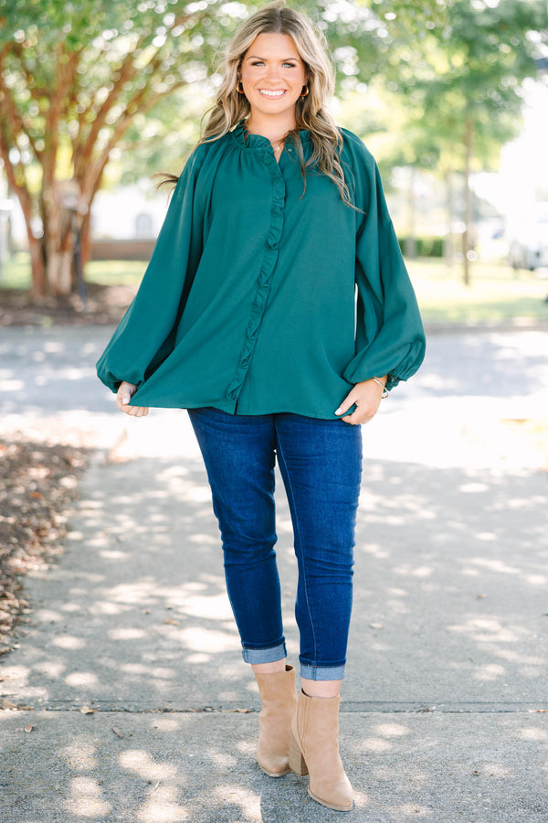 Plus Size forest green long sleeve top with a ruffled neckline and button-down front.
