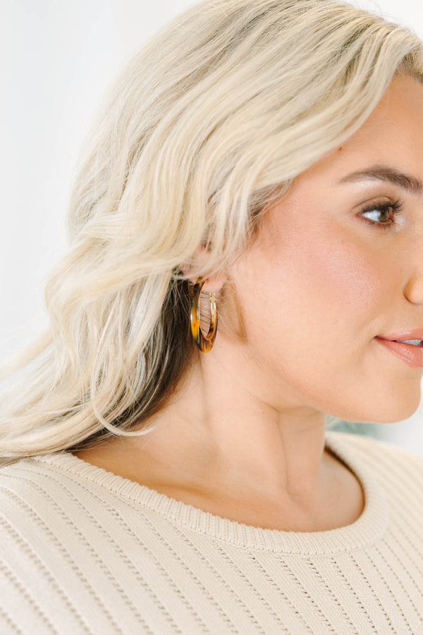 Pretty Little Pair brown tortoise-shell hoop earrings with gold-tone accents.