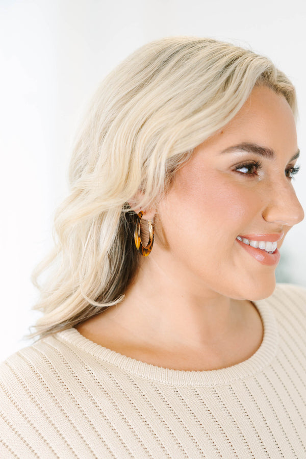 Pretty Little Pair brown tortoise-shell hoop earrings with gold-tone accents.