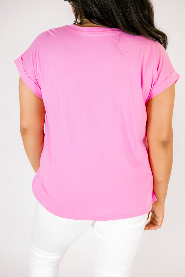 candy pink tee with cuffed short sleeves and a round neckline