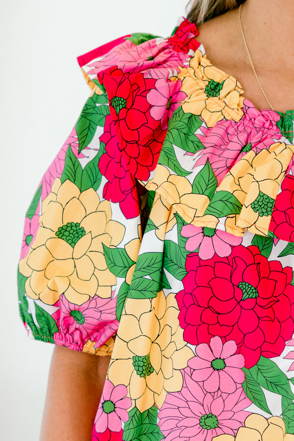 Chic Soul plus size clothing, off-the-shoulder pink top with puffed short sleeves and orange and fuchsia floral pattern