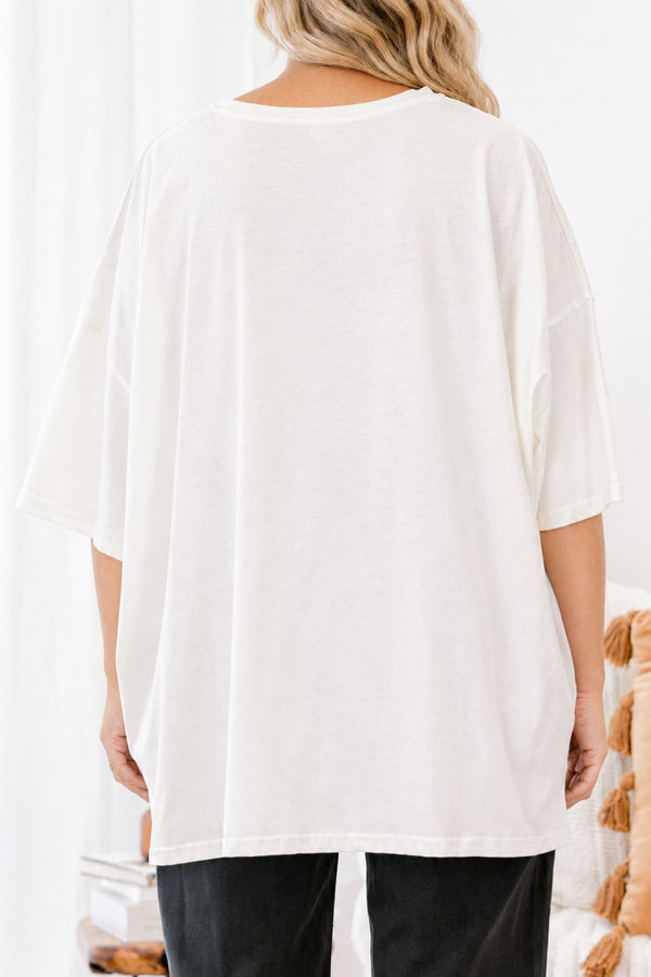Chic Soul plus size clothing, Ivory short sleeve graphic tee with a jack-O-lantern on the center of the shirt that is filled with various patterns 
