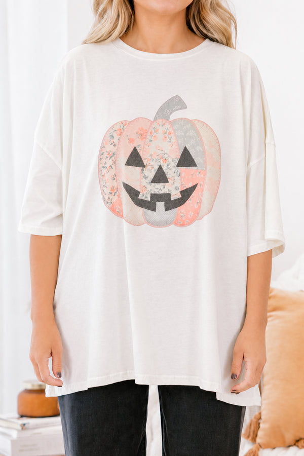 Chic Soul plus size clothing, Ivory short sleeve graphic tee with a jack-O-lantern on the center of the shirt that is filled with various patterns 