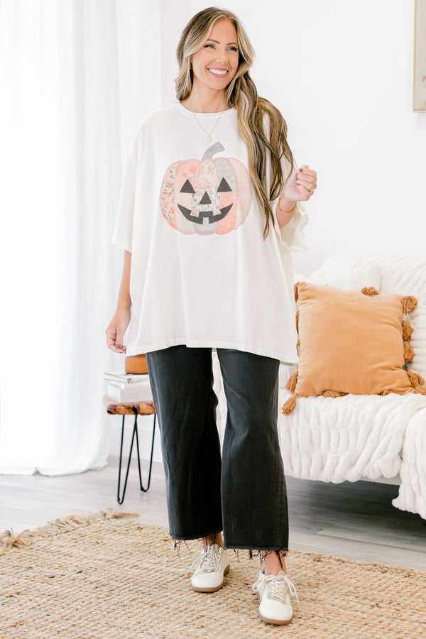 Chic Soul plus size clothing, Ivory short sleeve graphic tee with a jack-O-lantern on the center of the shirt that is filled with various patterns 