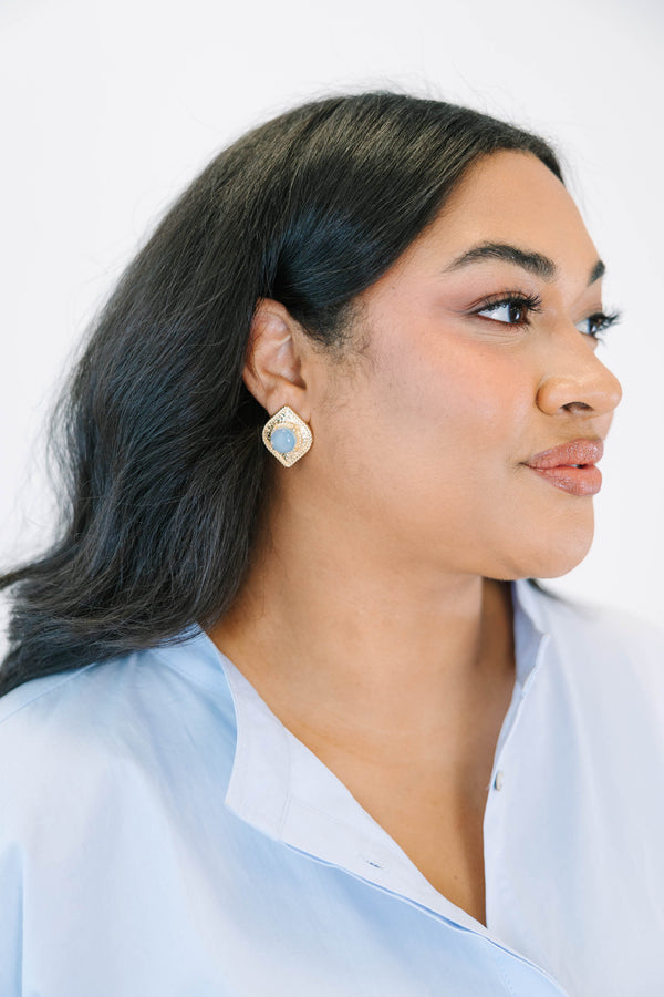 Plus Size gold-plated stud earrings with a luminous moonstone center and textured square frame.