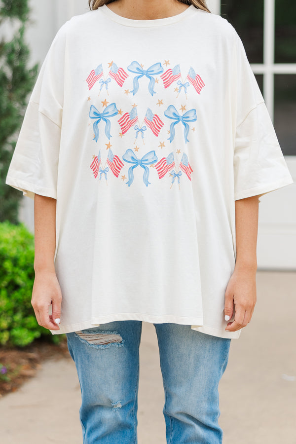 Chic Soul plus size clothing, ivory short sleeve boyfriend tee with american flag and blue bow graphic