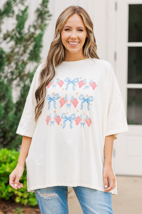 Chic Soul plus size clothing, ivory short sleeve boyfriend tee with american flag and blue bow graphic