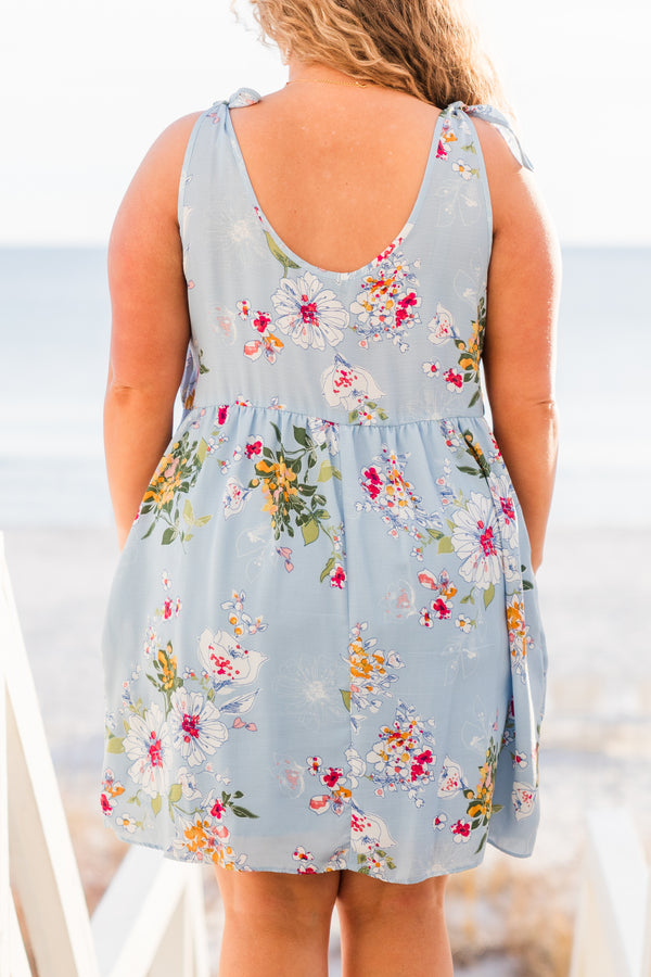 Chic Soul plus size clothing, blue sleeveless mini dress with floral design with tie straps and round neckline with pockets