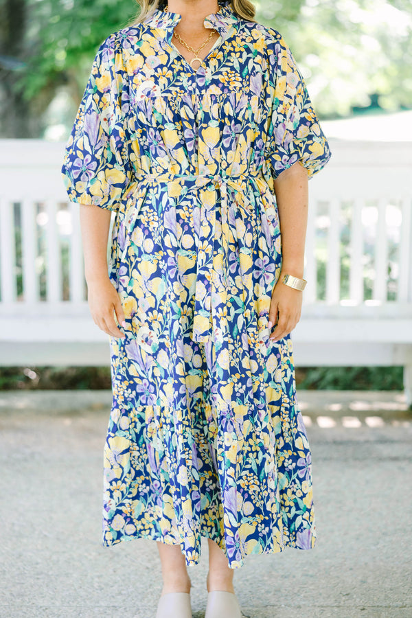 Plus Size navy floral midi dress with puff sleeves, a tiered skirt, and a matching waist tie.