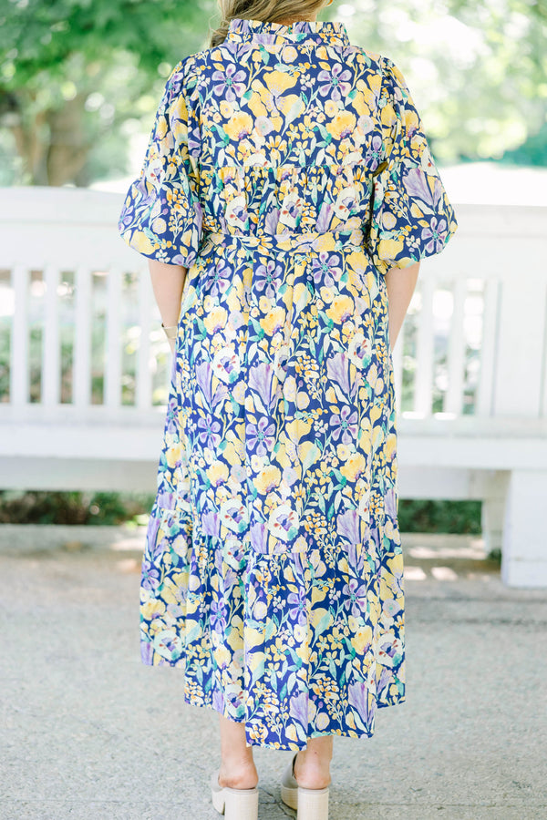 Plus Size navy floral midi dress with puff sleeves, a tiered skirt, and a matching waist tie.