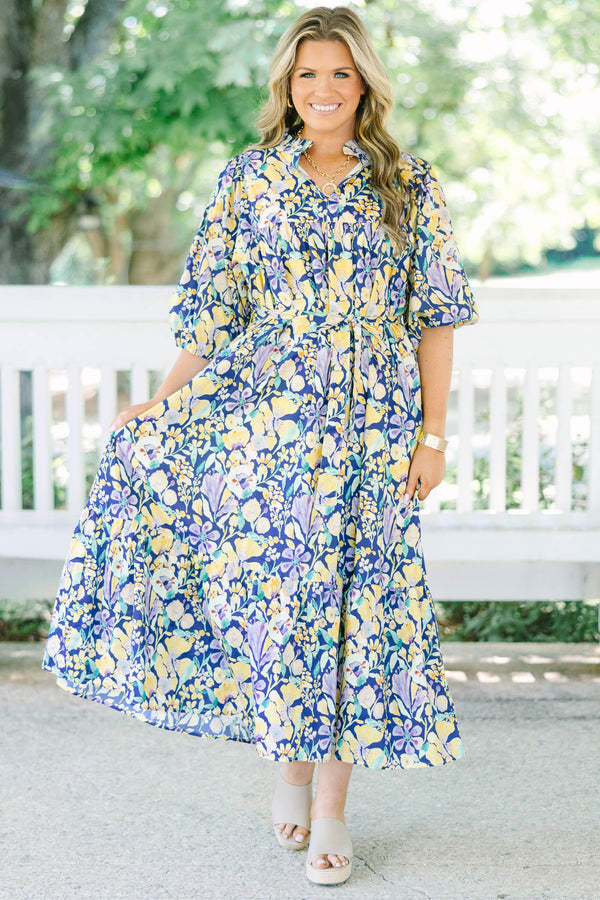 Plus Size navy floral midi dress with puff sleeves, a tiered skirt, and a matching waist tie.