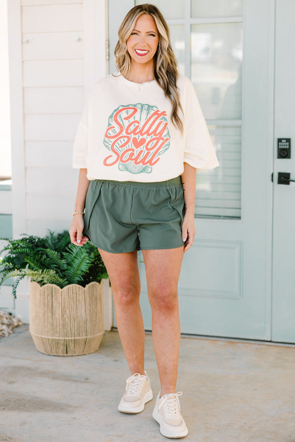 Chic Soul plus size clothing, short-sleeve ivory white boyfriend tee with a high-scoop-neckline and a coral orange calligraphy lettering stating 