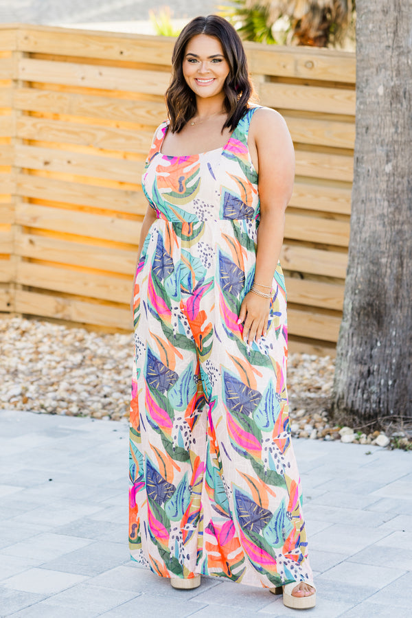 Chic Soul plus size clothing, sleeveless fuchsia multi-colored flowy wide-leg jumpsuit with a square-neckline and a strap with a multi-colored tropical floral pattern