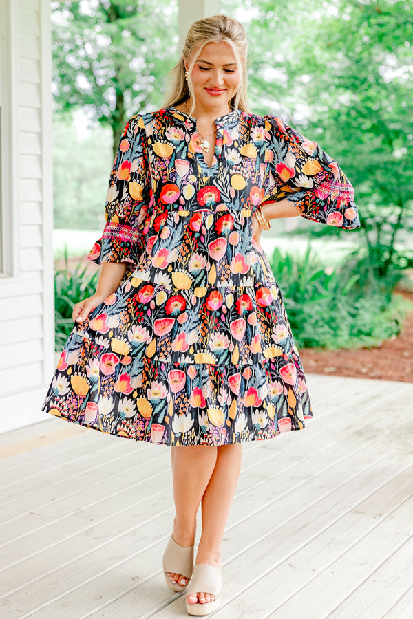 Chic Soul plus size clothing, navy blue ruffle cuffed half sleeve slit neckline short tiered dress with large pink and yellow floral pattern