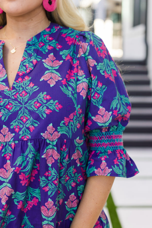 Chic Soul plus size clothing, blue baby doll dress with half sleeves that have a ruffle at the end of each sleeve as well as a multi color floral block pattern throughout 