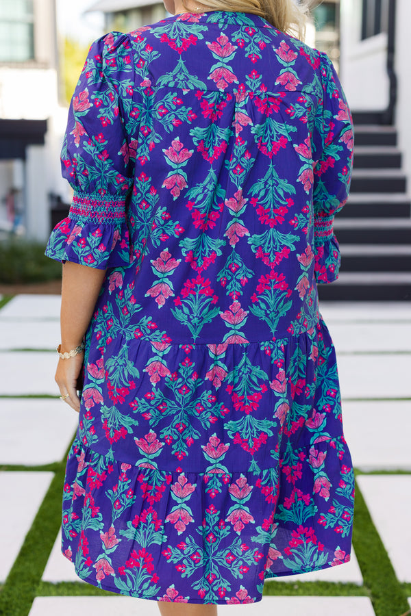 Chic Soul plus size clothing, blue baby doll dress with half sleeves that have a ruffle at the end of each sleeve as well as a multi color floral block pattern throughout 